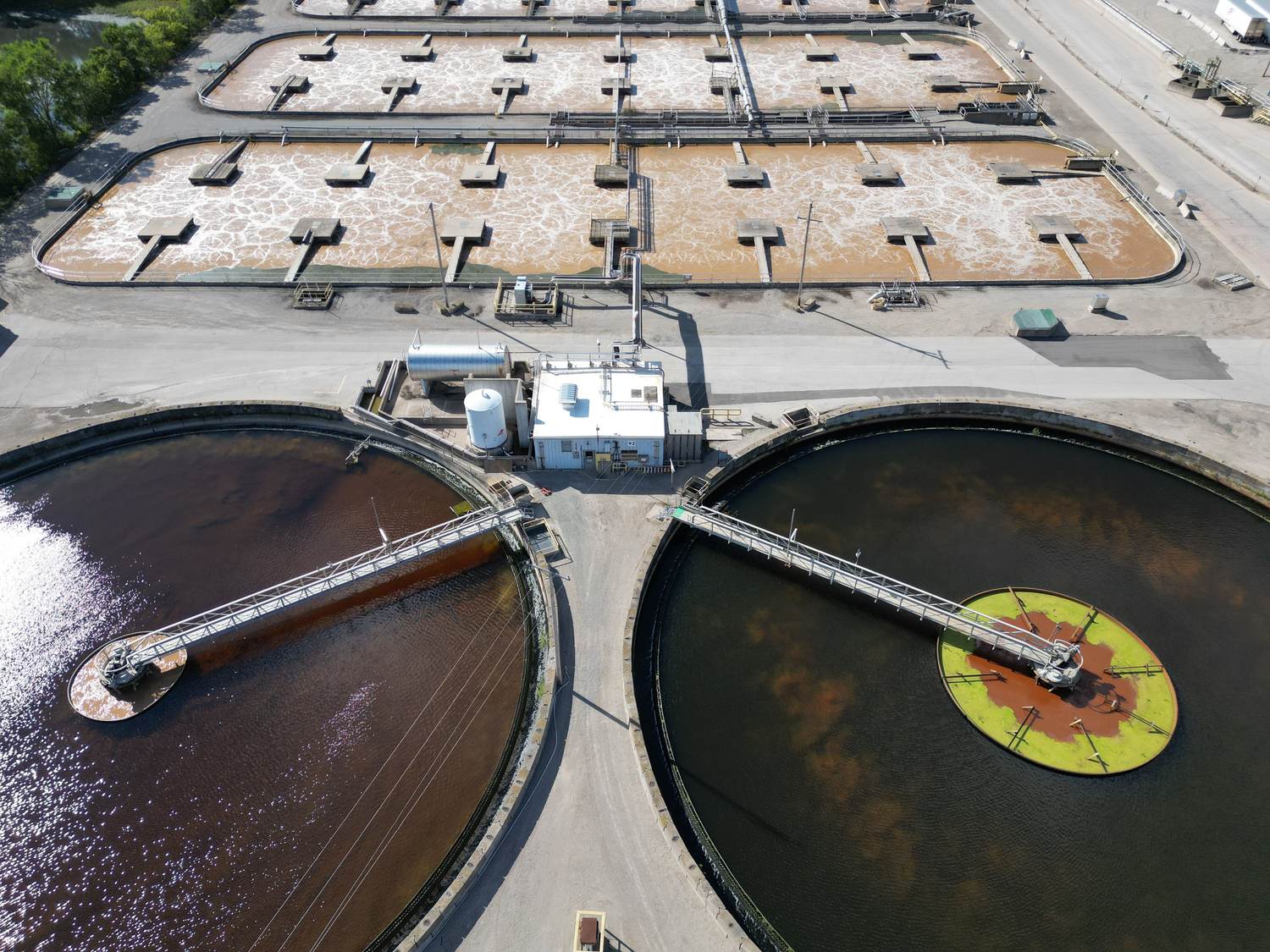 Aerial view of aeration basins and clarifiers at a wastewater treatment works